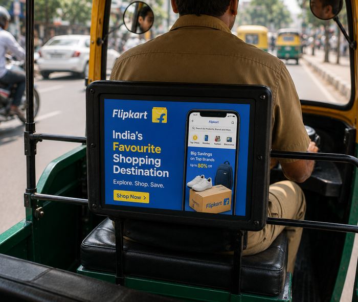Adzona backlit poster ad installed on a Guntur auto-rickshaw